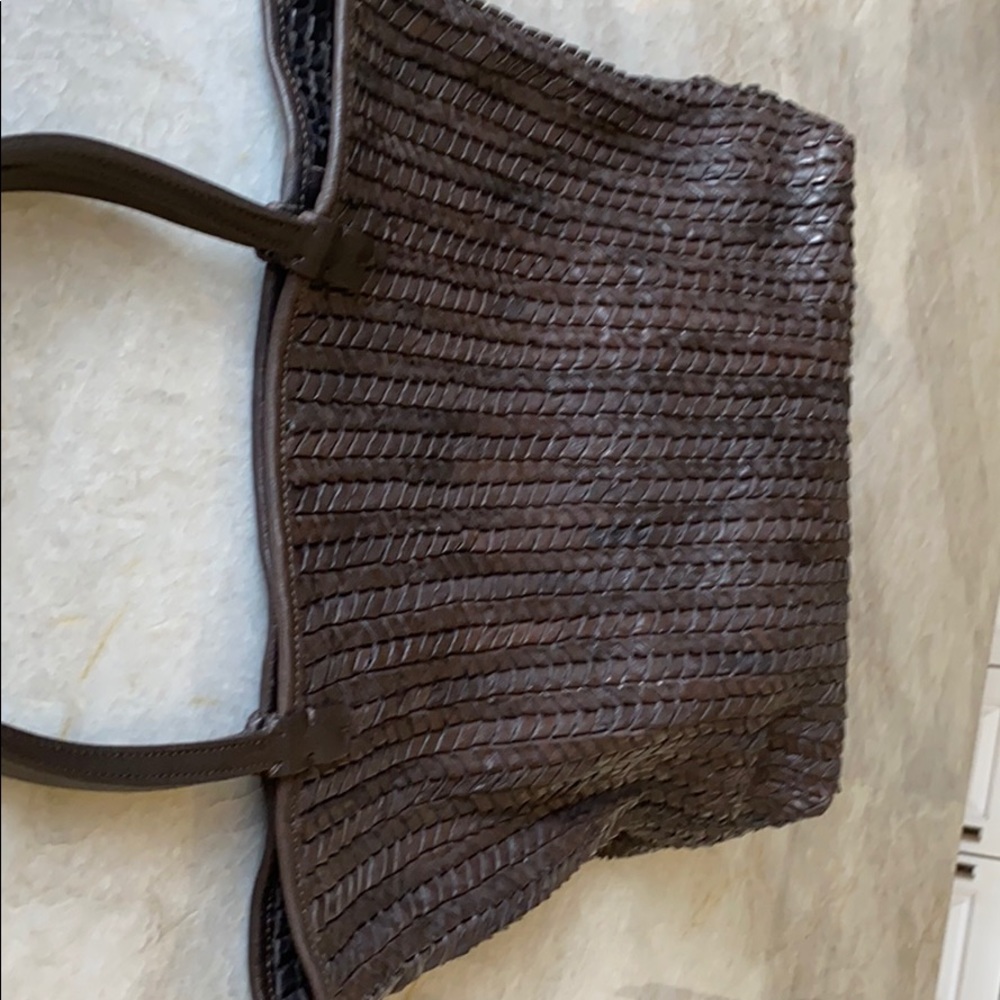 Brown woven leather purse.